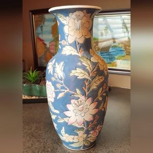 Ceramic, floral vase. Semi gloss finish. Colorful flowers with leaves and buds.